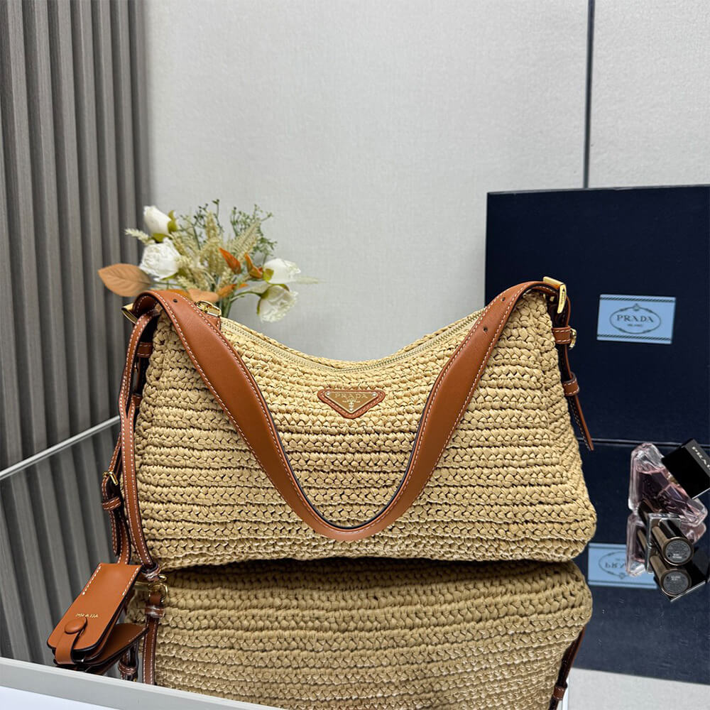 Pra*a Aimée large crochet and leather bag